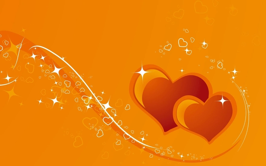 Два сердечка на оранжевом фоне среди бликов