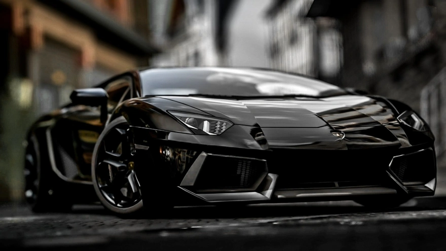 Чёрный Lamborghini Aventador вид спереди
