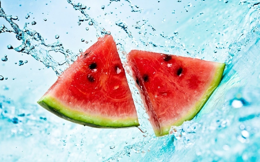 Slices of watermelon thrown into the water