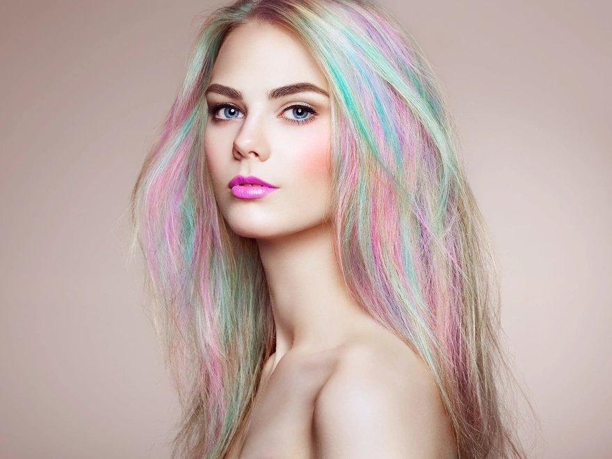 Blonde girl with rainbow streaked hair