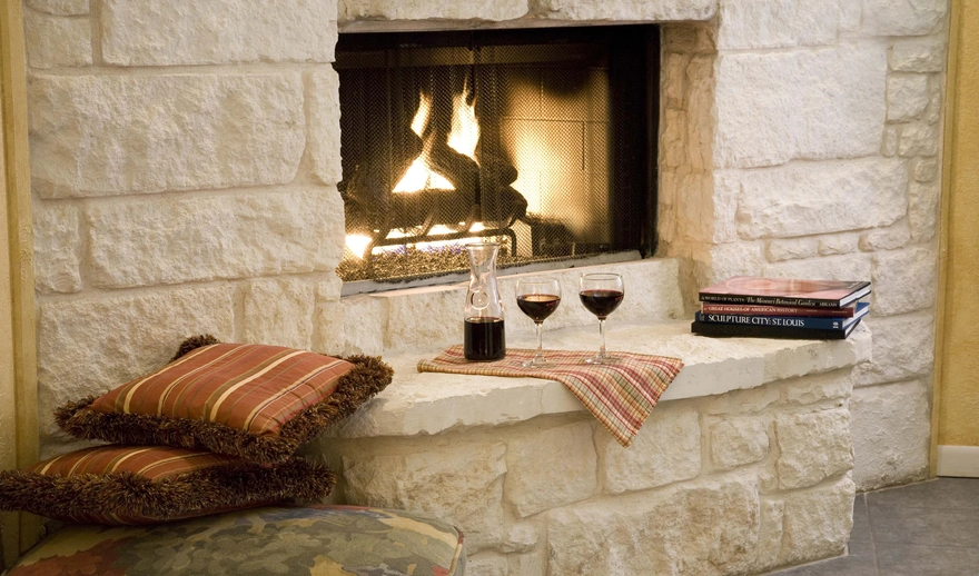 The wine by the fireplace