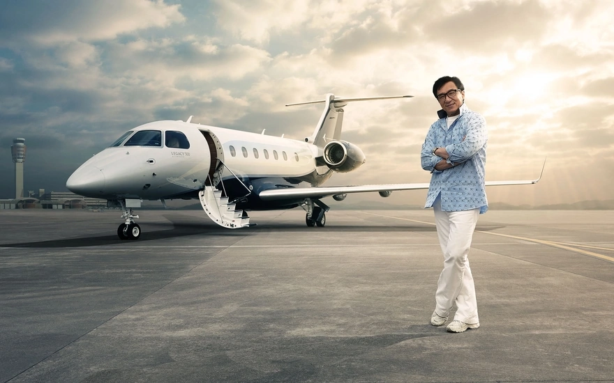Jackie Chan and his personal airplane Embraer Legacy 500