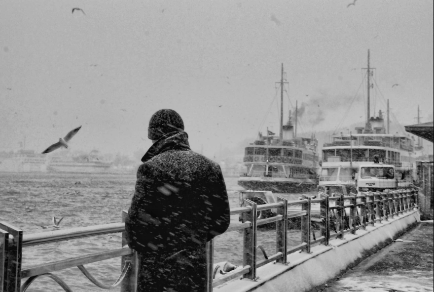 A man on the pier in winter