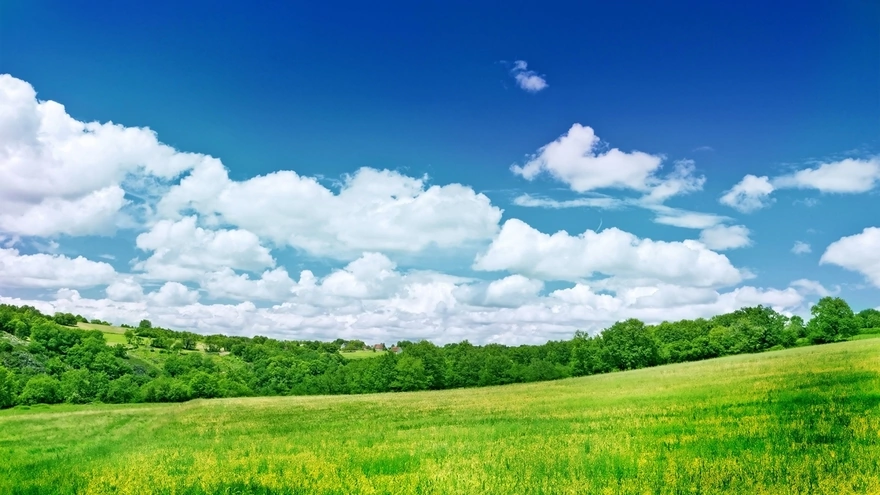 Clouds over a rural meadow