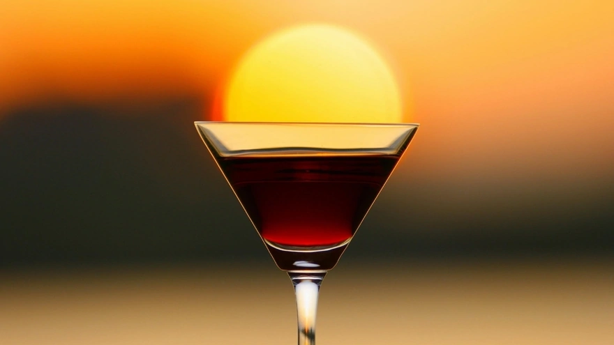 The sun sets in a glass of wine