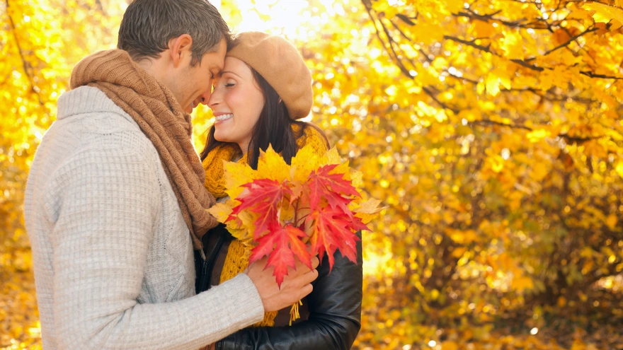 Couple in love in colors of Golden autumn