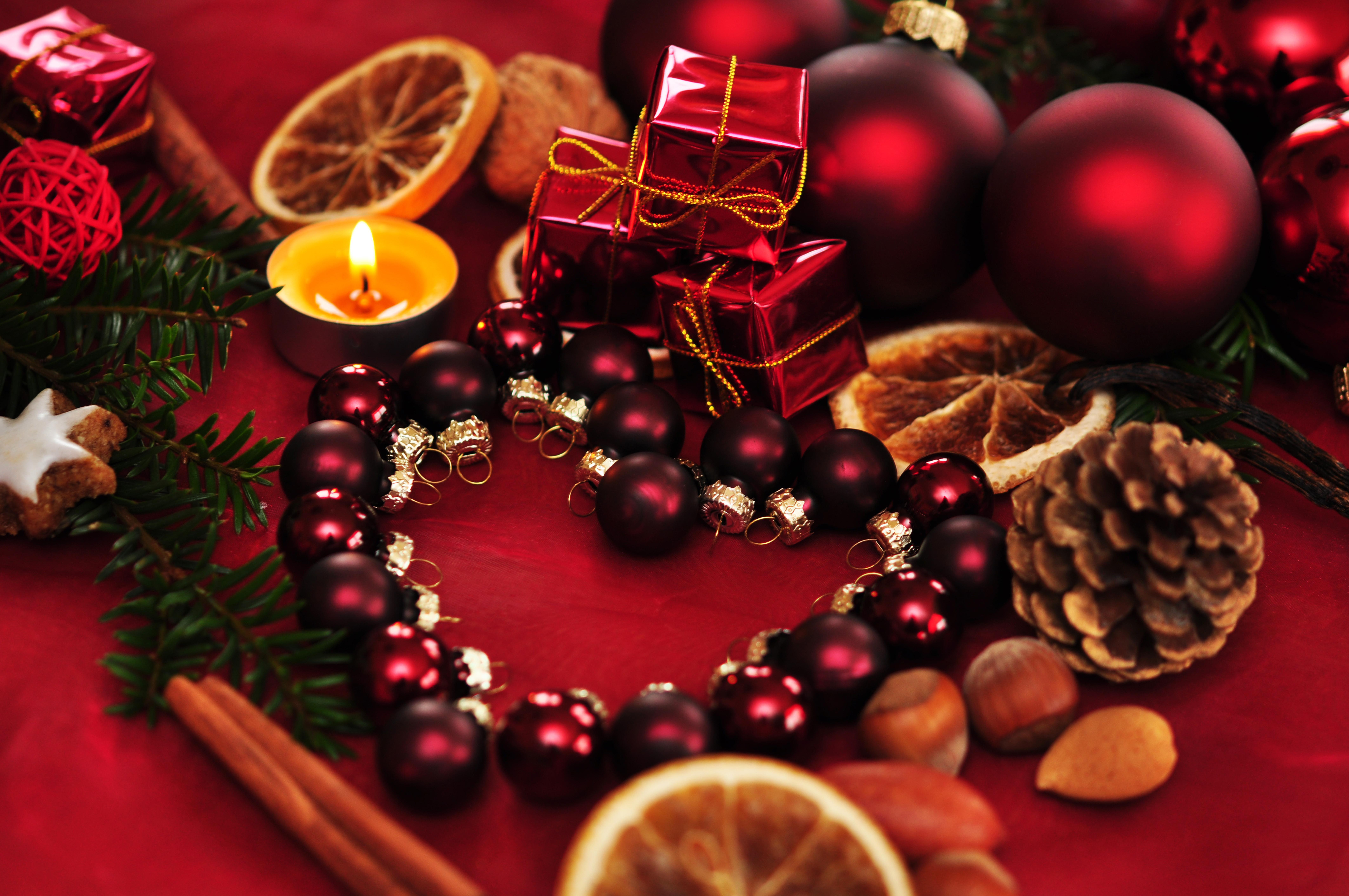 Image: Decor, Christmas balloons, heart, candles, nuts, cinnamon, bump, new year, red background