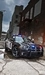 Картинка: Полицейская машина в переулке