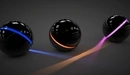 Image: Black balls with colored stripes