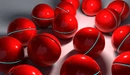 Картинка: Красные яркие шары с полоской по диаметру
