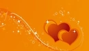Картинка: Два сердечка на оранжевом фоне среди бликов.