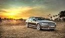 Картинка: Автомобиль Audi A6 на фоне заката
