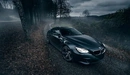 Картинка: BMW m6 со включенными фарами на дороге