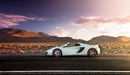 Image: Mclaren supercar on the road.