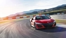 Картинка: Honda NSX - спортивный автомобиль едет по трассе