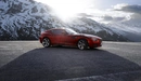 Картинка: BMW Zagato стоит на фоне снежных гор и освещается солнечными лучами