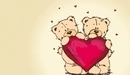 Картинка: Медвежата Тедди держат большое сердце.