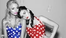 Image: Blonde and brunette in dresses with white polka dots