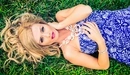 Image: Aida Ridic beautiful lying on the grass.