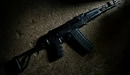 Image: Black AK-47 with a folding stock