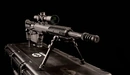 Картинка: Снайперская винтовка установленная на чемодане
