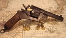 Картинка: Револьвер с патронами лежит на карте.