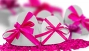 Картинка: Коробочки перевязанные лентой в виде сердечек ко Дню всех влюблённых