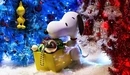 Image: Toy puppy brought a box of balls for decorating Christmas tree.