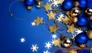 Image: Blue and golden Christmas balls with stars and snowflakes.