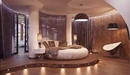 Image: Bedroom with a round bed.