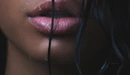 Image: Beautiful wet lips brunettes closeup.