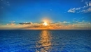 Картинка: Солнце над синим морем