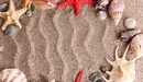 Картинка: Узоры на песке в виде волны.