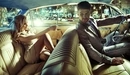 Картинка: Девушка с парнем сидят в салоне авто