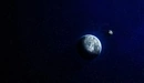 Картинка: Освещенная светом планета и спутник.