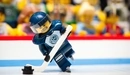 Картинка: Человечек из Lego играет в хоккей.