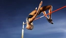 Картинка: Спортсменка выполнила прыжок через перекладину