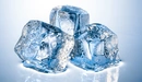 Image: Three ice cubes are melting