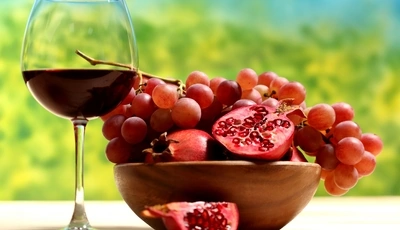 Image: Glass, wine, grapes, pomegranate