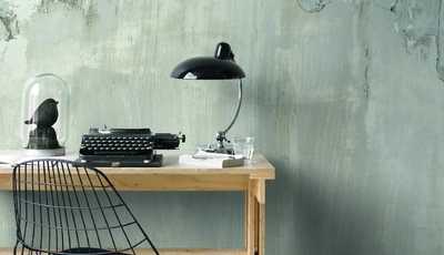 Image: Desk, lamp, wall, table, typewriter, stuffed, chair