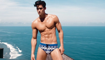 Image: Male, man, model, muscle, torso, trunks, sea, posing