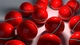 Картинка: Красные яркие шары с полоской по диаметру
