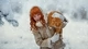 Image: Red-haired girl and red cat in winter