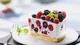Image: A delicious slice of cake with berries