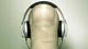 Image: Finger simulating his head listening to music on headphones