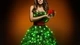 Картинка: Девушка в платье из веток елки с подарком