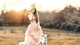 Картинка: Девушка в поле с козлёнком