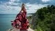 Image: Girl in beautiful dress posing on the background of beautiful scenery