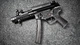 Image: The submachine gun lies on a gray texture