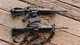 Image: Two machine guns with ammunition scattered around